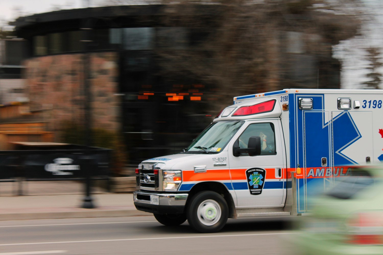 An ambulance traveling on a road, an example of special mode transportation