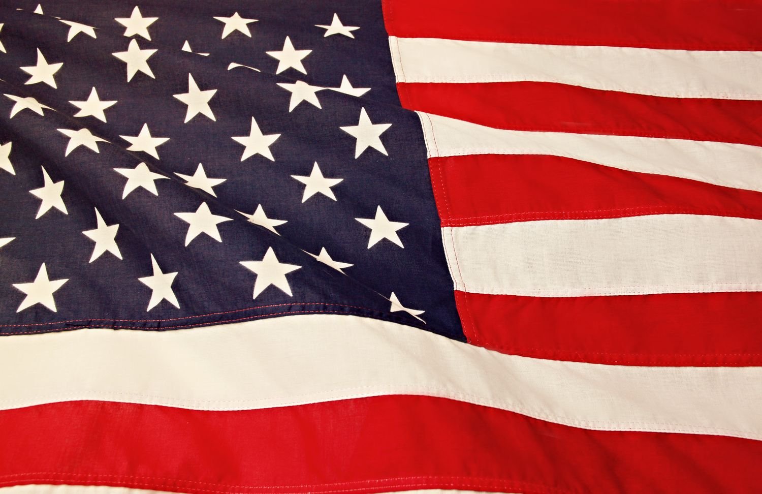 A detailed image of the American flag showing the stars and stripes