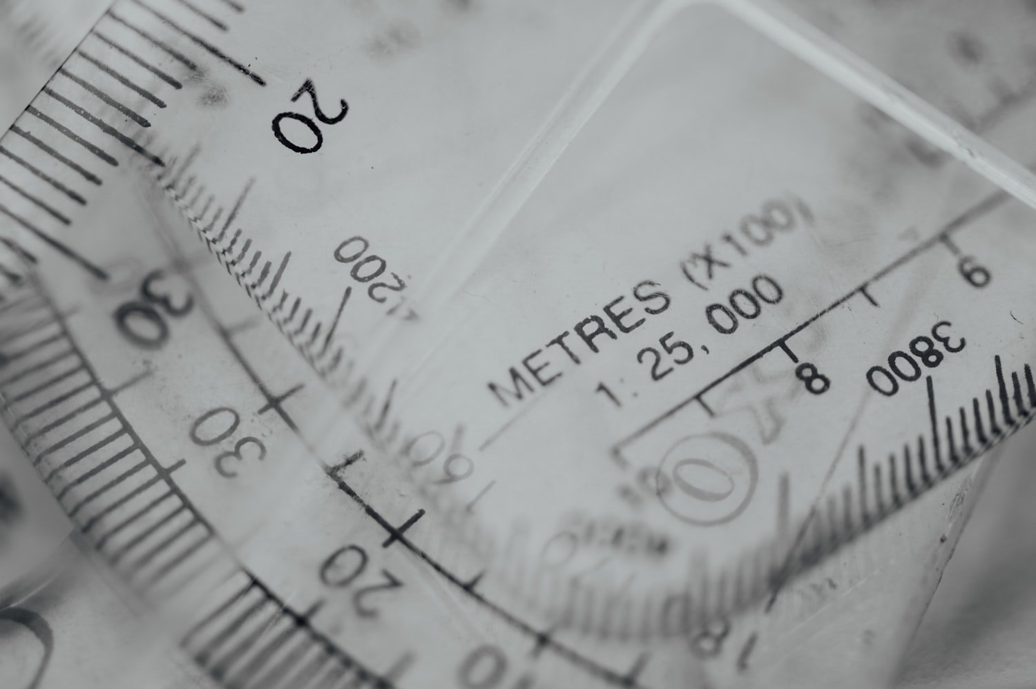 An analog gauge with degree markings, like the goniometer used to measure spinal range of motion