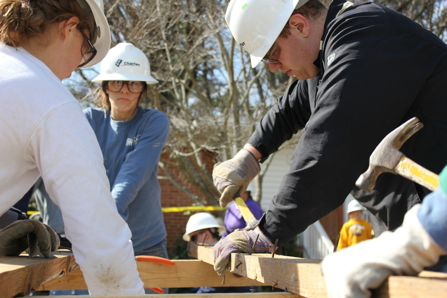 A volunteer at work on a community service project