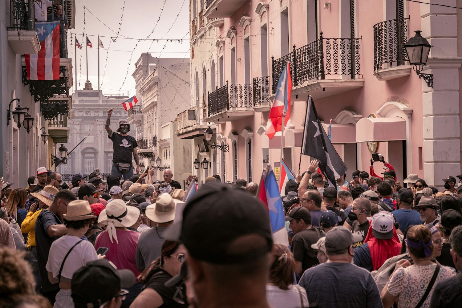A crowd gathered in a street for a public observance
