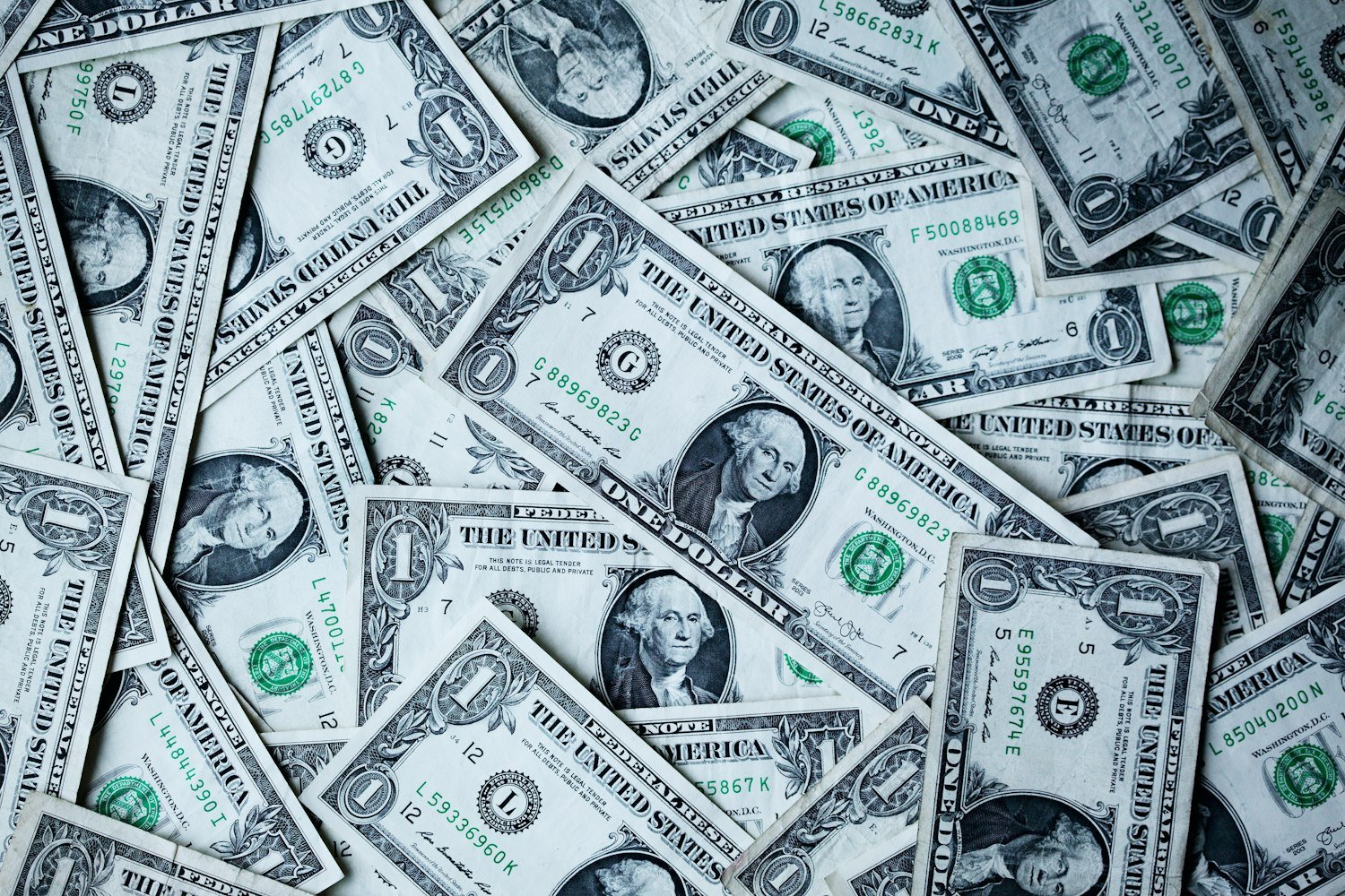 United States dollar banknotes, representing monthly compensation payments