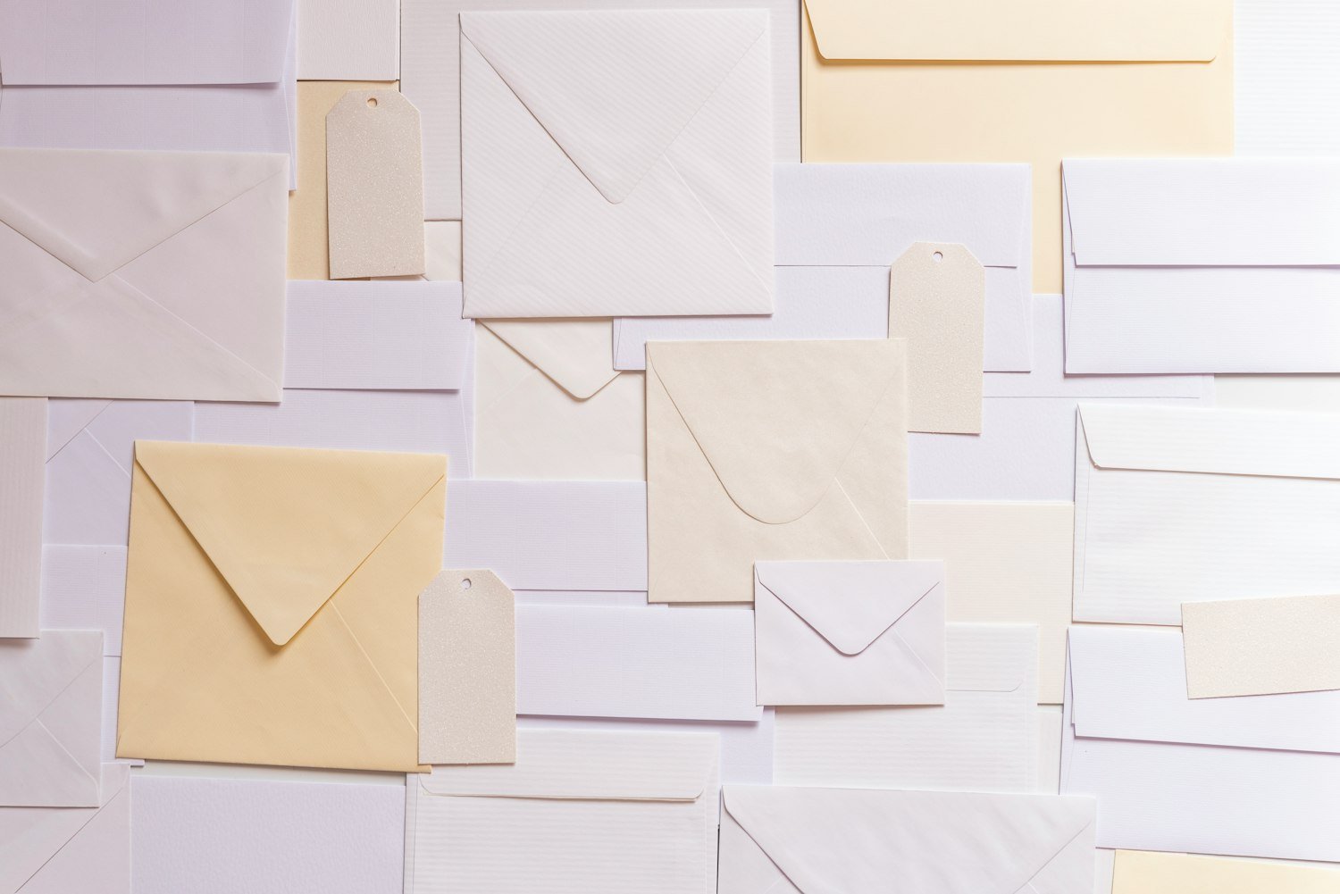 A stack of envelopes, representing mailing an SF-180 records request form