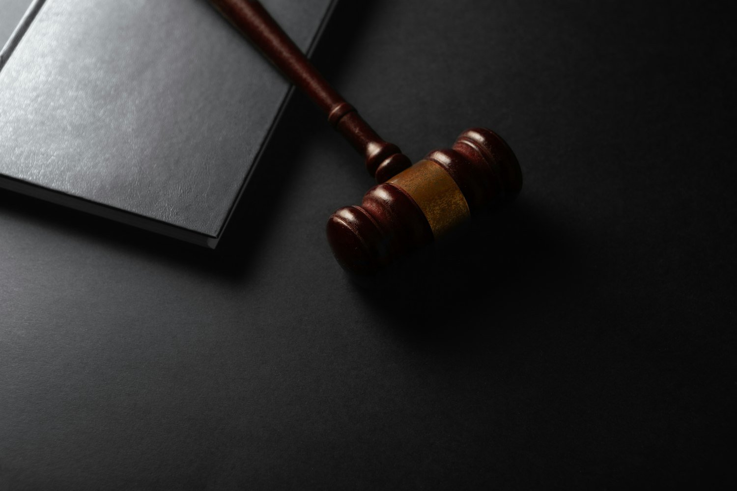 A wooden gavel resting beside a book, representing the Board of Veterans' Appeals