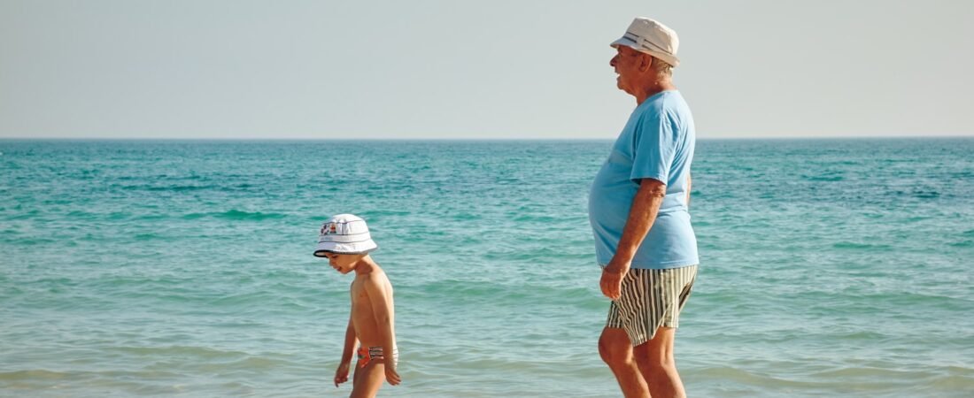 An older man and a boy walking together, representing the generational link at the heart of the Sons of The American Legion