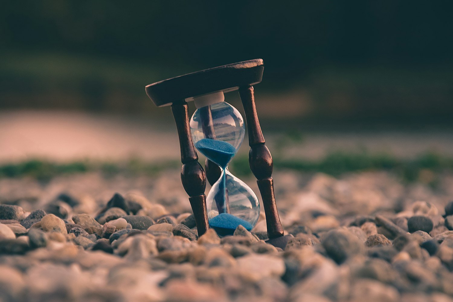 An hourglass on stones, representing VA appeal processing times