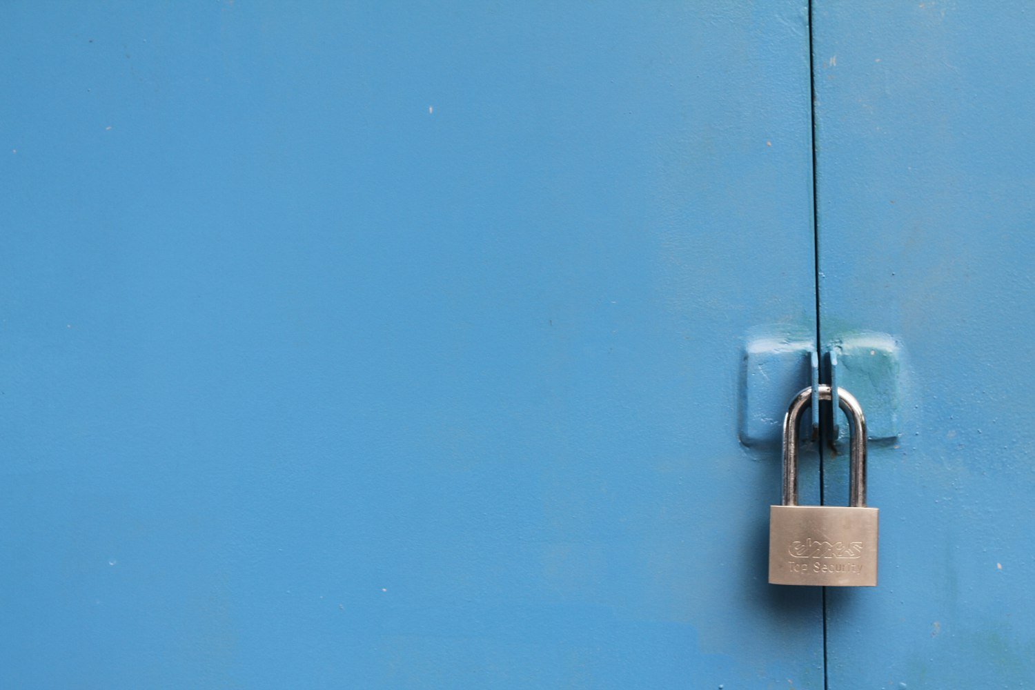 A padlock, representing guaranteed acceptance and locked-in coverage