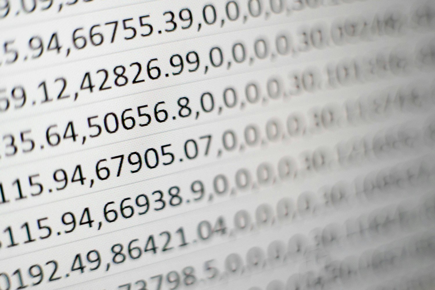 A printed sheet of numbers, representing comparing payment calculations