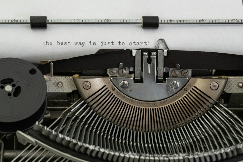 A typewriter on a white table