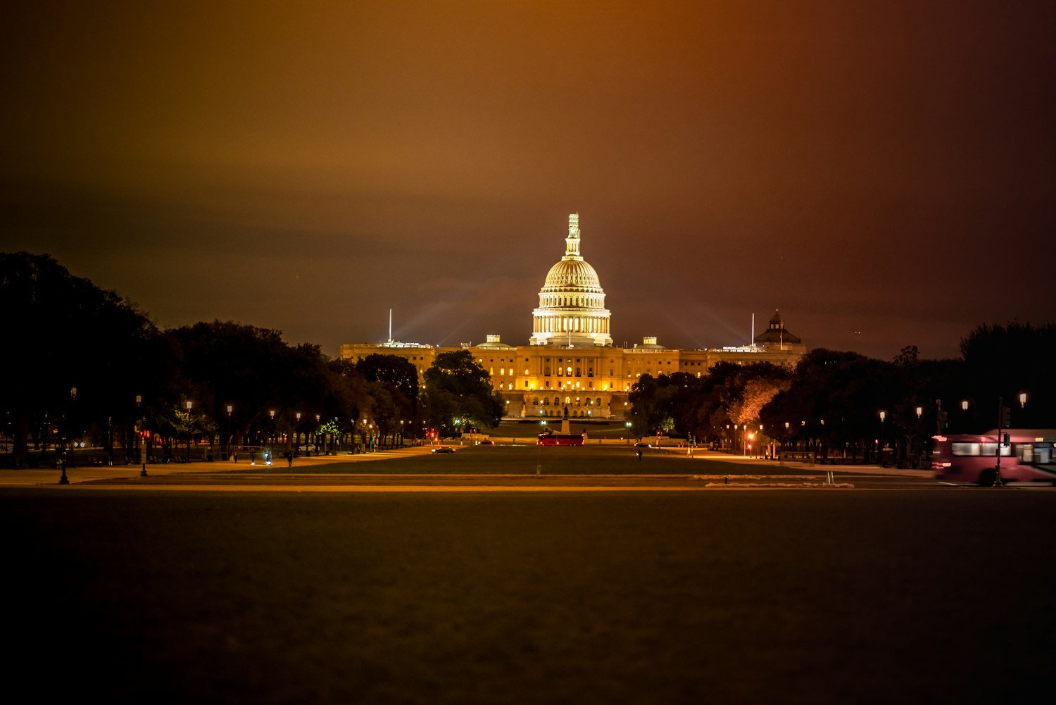 The U.S. Capitol building at night, representing the congressional charters held by both the American Legion and the VFW