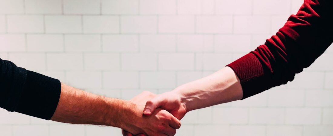 A welcoming handshake, representing how new members are welcomed when joining American Legion Post 51 in Lebanon, Oregon