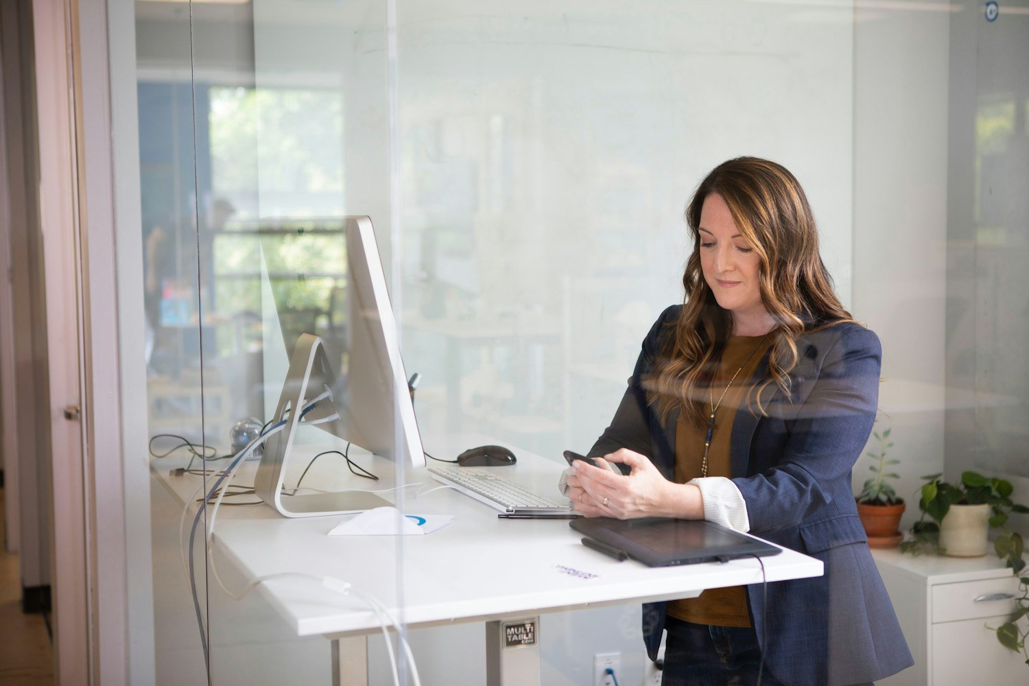 A woman working on a laptop, representing women veterans in civilian careers