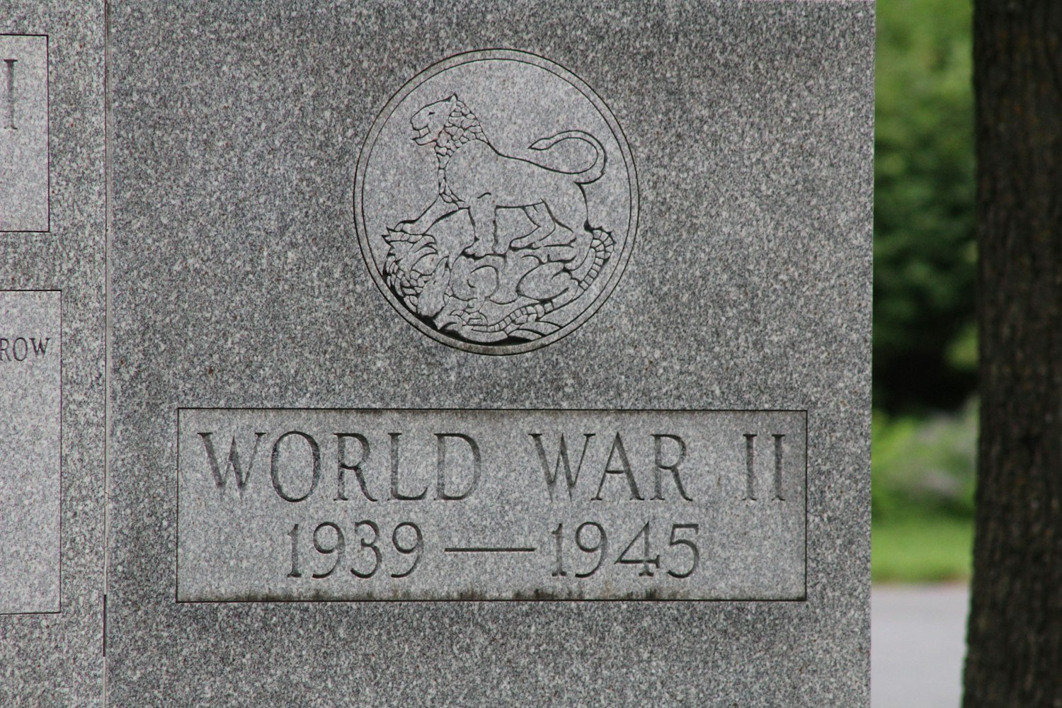 A World War II memorial inscription carved in stone